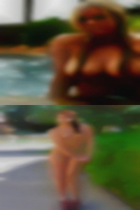 Caucasian nude female with green eyes.